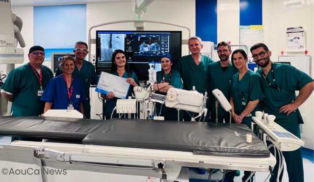 Equipe Nella Sala Di Cardiologia Interventistica