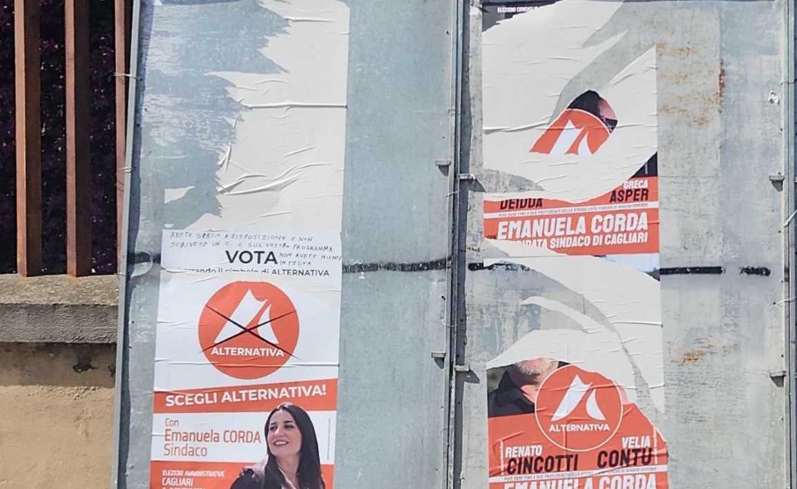 manifesti-strappati-a-Is-Mirrionis